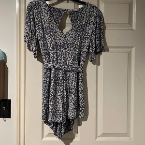 Open back floral romper with pockets